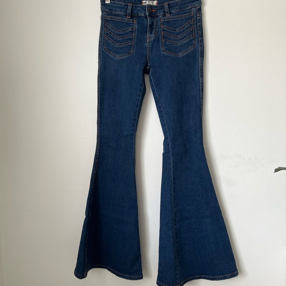 Free People 70s style mid rise denim bell bottoms | size 26